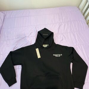 Essentials Black Fleece Hoodie     Brand new never worn